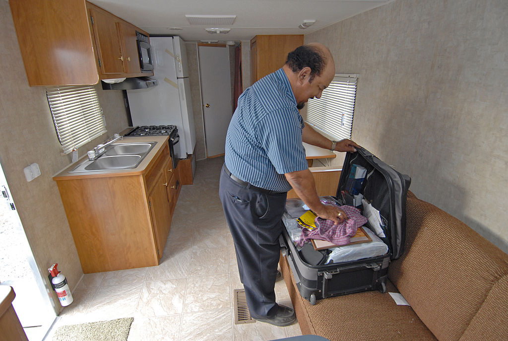 A professor from the Southern University at New Orleans moves into a FEMA trailer in April 2006, after Hurricane Katrina. - Marvin Nauman (FEMA Photo Library)